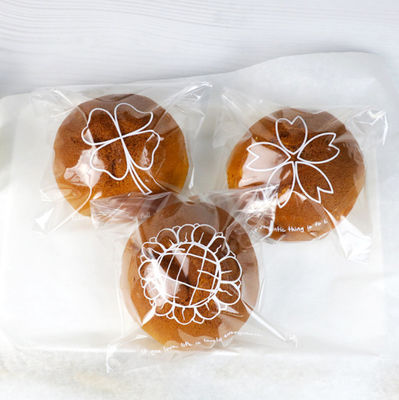 Saco plástico do empacotamento de pão do uso BOPP da fábrica 60-200 mícrons