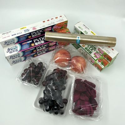 O empacotamento transparente dos PVDC adere-se filme para refrigerar o fruto vegetal
